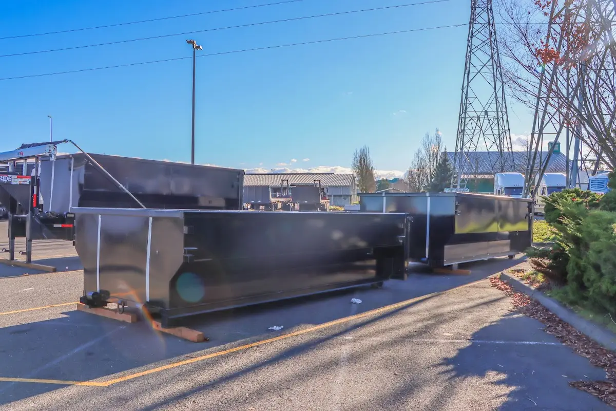 Roll-off dumpster ready for waste disposal at job site for Demolition Dumpster Rental in Skaneateles